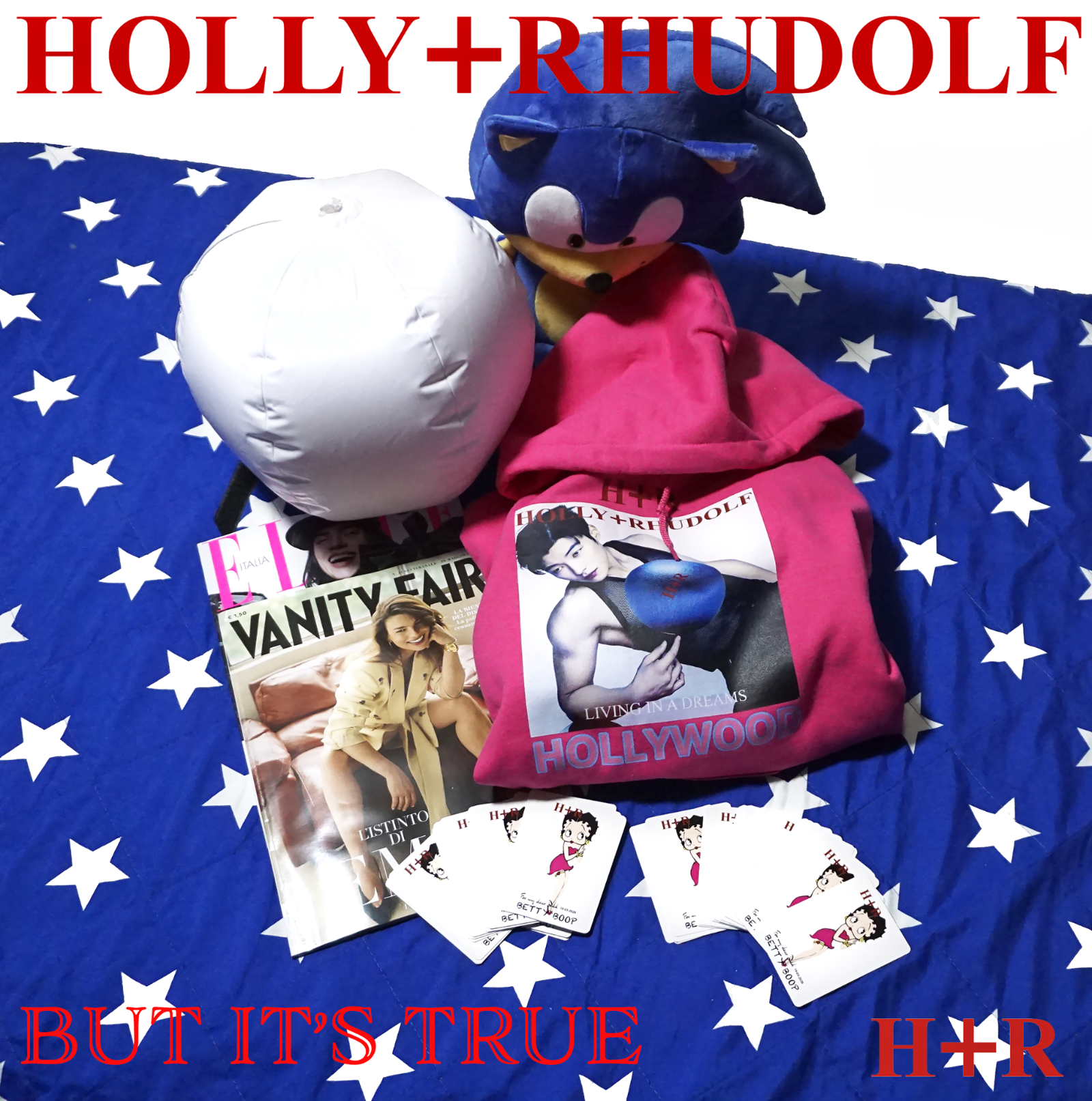 BUT IT’S TRUE.

This isn’t a moodboard. It’s a confession.

Stars and stripes, Sonic on watch, Betty Boop winking back. Glossy magazines and technicolor dreams.

HOLLY+RHUDOLF is everything Hollywood promised you at 3am in front of the TV, when the line between real and fake got blurry.

The hoodie exists. It’s real. Heavyweight 350gsm, high-definition front print. 
On-demand. No warehouse, zero lies. We print only when you order.

H+R. LIVING IN A DREAMS.

